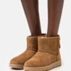 Ugg Classic Mini Logo Zip - Korte Laarzen - Chestnut 16 Ugg Classic Mini Logo Zip - Korte Laarzen - Chestnut -Ugg Winkel 532a050e63994b8d8da8a740b65fd9a8