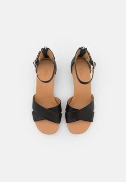 Ugg Eugenia - Sandalen Met Sleehak - Black 11 Ugg Eugenia - Sandalen Met Sleehak - Black -Ugg Winkel 8f4e30877eb74db082f637eec0c2ed92
