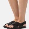 Ugg Solivan Slingback - Sandalen - Black 17 Ugg Solivan Slingback - Sandalen - Black -Ugg Winkel c734cb011b774e9e897d4029b953c730
